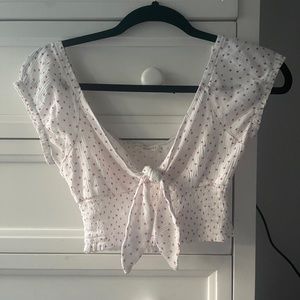 white crop with pink flowers